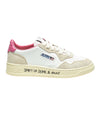 Sneakers Donna bianche con dettagli rosa e con scritta nera sulla suola