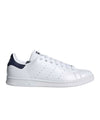 Immagine laterale Sneakers con iconiche 3 strisce traforate