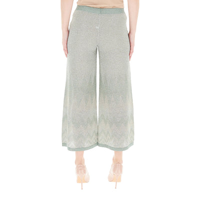 Pantaloni Donna a palazzo in lurex verde modella retro
