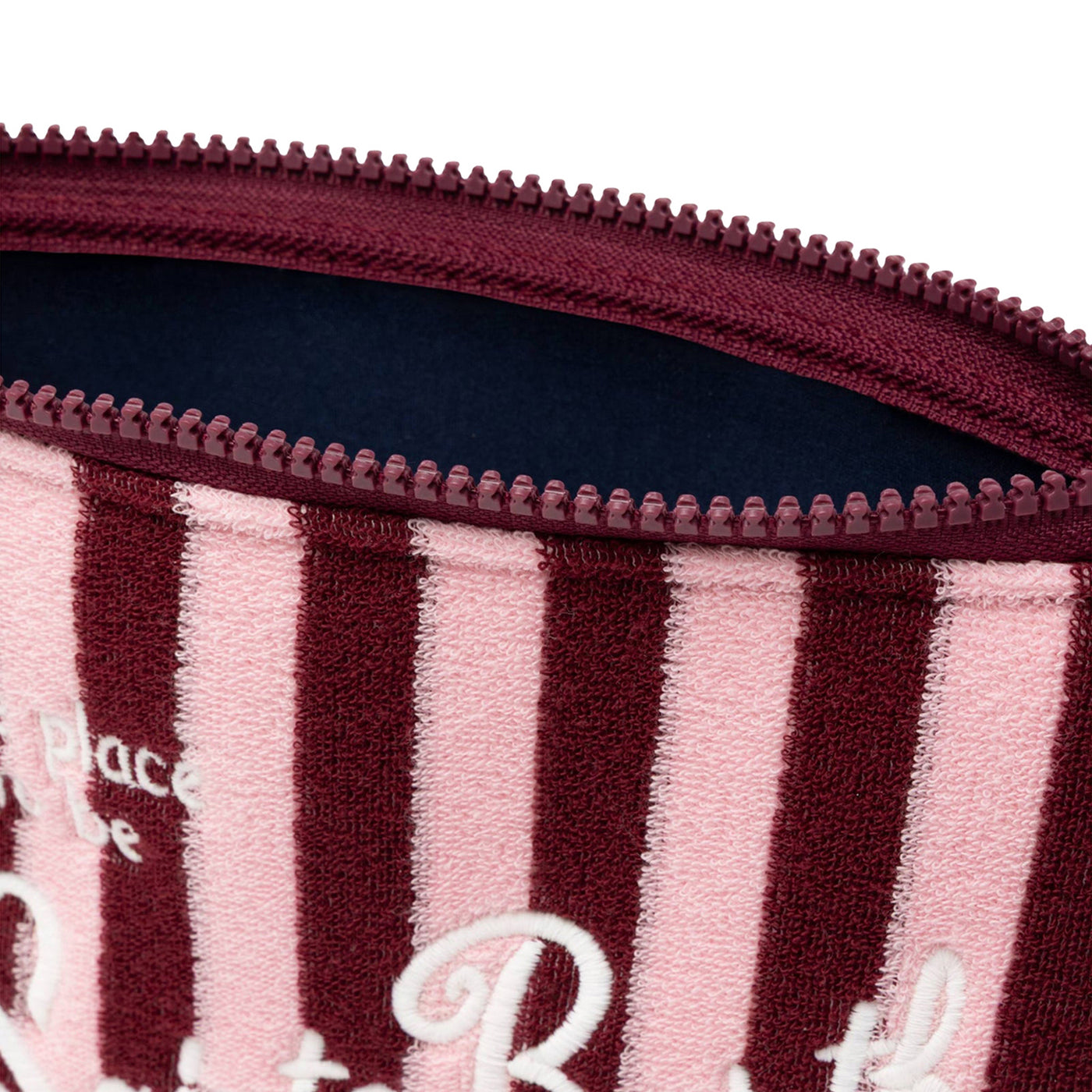Pochette Donna effetto spugna a righe rosa/bordeaux dettaglio zip aperta