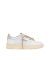 Acquista subito le Sneakers Donna, in pelle e lacci in lurex dorato e logo laterale, firmate Autry su Old England: vieni a scoprire tutta la collezione sul nostro sito