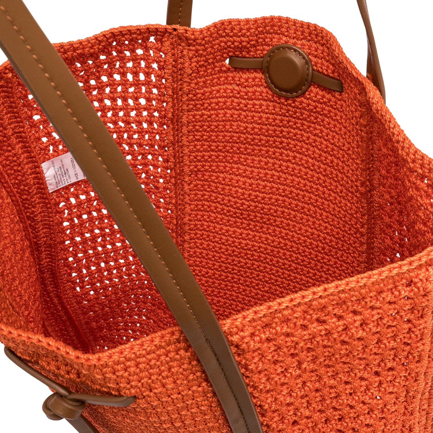 Borsa da donna a spalla traforata arancione dettaglio interno
