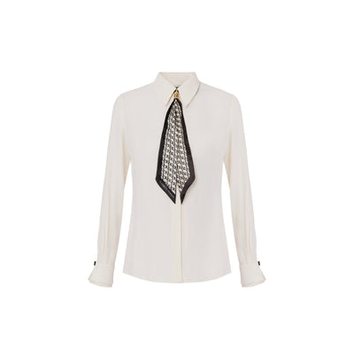 Acquista subito la Camicia Donna, modello georgette, in viscosa con polsi in organza e bottoncini, firmata Elisabetta Franchi su Old England: vieni a scoprire tutta la collezione sul nostro sito