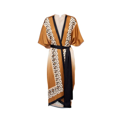 Acquista subito il Copricostume Donna, con taglio morbido, scollatura a V e cinturino in vita, firmato MaxMara su Old England: vieni a scoprire tutta la collezione sul nostro sito.