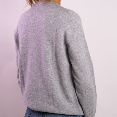 Maglia Donna in cashmere grigio con scollo a V retro