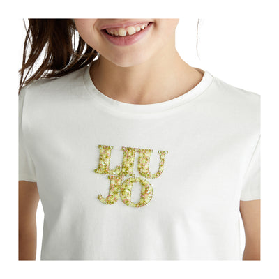 T-shirt Bambina Bianca con logo e strass  modella ravvicinata