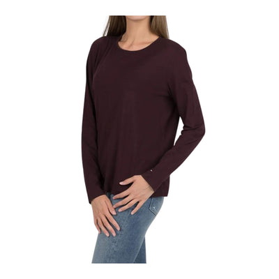 Women's sweater with button closure on the back