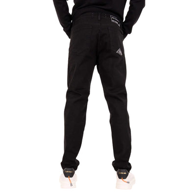 Jeans Uomo in denim di cotone dal lavaggio nero, con etichetta posteriore 