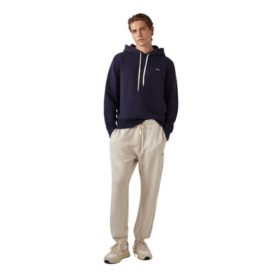 Pantaloni Tuta Uomo Grigio con logo su modello frontale