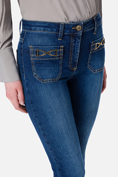 Women's trousers with gold clamps