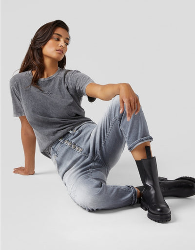 Women's trousers with rips and mends