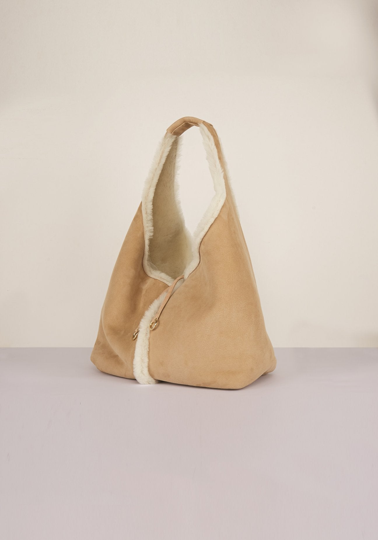 Borsa Donna in montone con chiusura con nastri