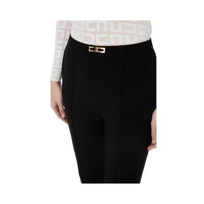 Women's trousers in tapered technical fabric