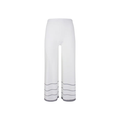 Pantalone bianco tinta unita lunghezza alla caviglia. Parte anteriore.