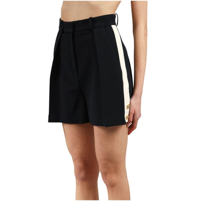 Short da donna nero con bande a contrato laterali e bottoni light gold. Realizzato in misto viscosa con passanti cintura.