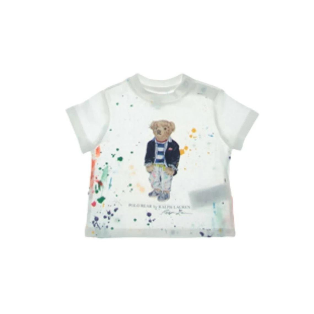 T-shirt Bambina 5-7 anni con schizzi di pittura
