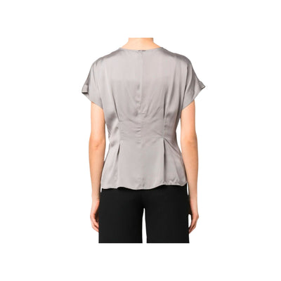 Women's flared blouse with pleats
